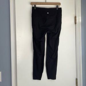 Lululemon black running leggings sz 8 with ankle calf mesh and waist pocket